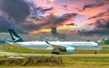 Ho Chi Minh City, Vietnam - February 26th, 2022: Airplane bearing number B-LRV Airbus A350 of Cathay Pacific prepare take off from Tan Son Nhat International Airport, Ho Chi Minh City, Vietnam clipart