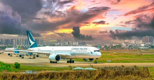 stock image Ho Chi Minh City, Vietnam - February 26th, 2022: Airplane bearing number B-LRV Airbus A350 of Cathay Pacific prepare take off from Tan Son Nhat International Airport, Ho Chi Minh City, Vietnam