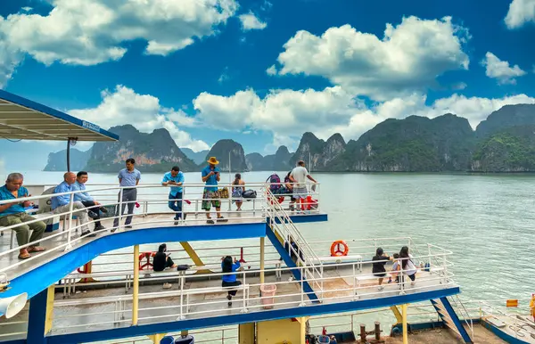 stock image Lan Ha bay, Hai Phong, Vietnam - April 4th, 2024: : Tourists on the ferry move from Ha Long Bay to Lan Ha Bay. Which is the UNESCO World Heritage Site, a beautiful natural wonder in northern Vietnam