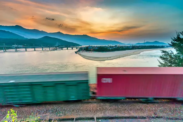 stock image Hue, Vietnam - April 15th, 2024: Lang Co bay in the sunset with a small fishing village completely below. This place was voted the most beautiful bay in the world in Hue, Vietnam