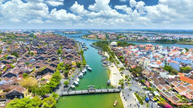 Hoi An, Vietnam - April 17th, 2024: Aerial view of Hoi An Ancient town which is a very famous destination for tourists. clipart