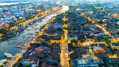 Hoi An, Vietnam - April 17th, 2024: Aerial view of Hoi An ancient town at dusk or night, this place is a UNESCO world heritage site. Hoi An is one of the most popular destinations in Vietnam clipart