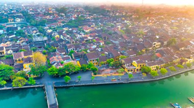 Hoi An, Vietnam - April 17th, 2024: Aerial view of Hoi An Ancient town which is a very famous destination for tourists. clipart