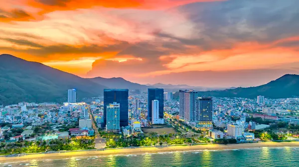 stock image Quy Nhon, Vietnam - April 18th, 2024: The coastal city of Quy Nhon seen from above in the afternoon with its beautiful city and clean sandy beach attracts tourists to visit in Quy Nhon, Vietnam