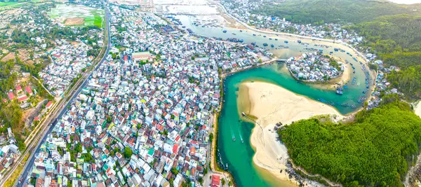 stock image Aerial view of Sa Huynh Bay, including fishing village, transportation system, urban area, the most beautiful beach in Central Vietnam