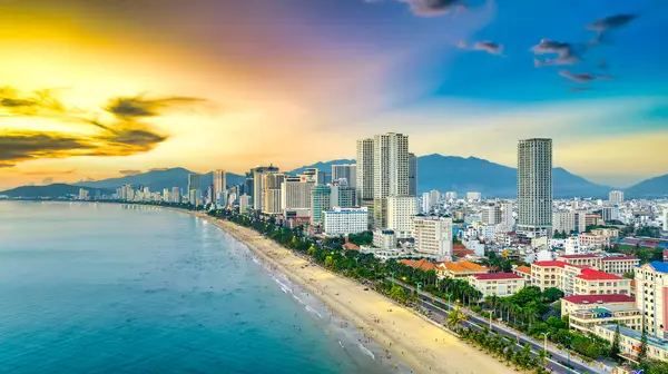 stock image Nha Trang, Vietnam - April 20th, 2024: Aerial view of the coastal city of Nha Trang in the afternoon with its beautiful city and clean sandy beach attracts tourists to visit in Nha Trang, Vietnam