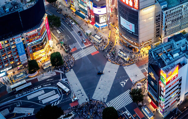 Aerial View of Shibuya scramble interesection in Tokyo, Japan at sunset
