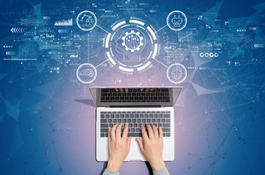 Bir dizüstü bilgisayar kullanan kişi ile gelecek teknolojisi kavramı