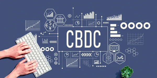 CBDC - Central Bank Digital Currency Concept with person using a computer keyboard