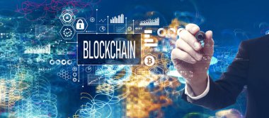 Blockchain theme with businessman in a bokeh neon light trails city night background