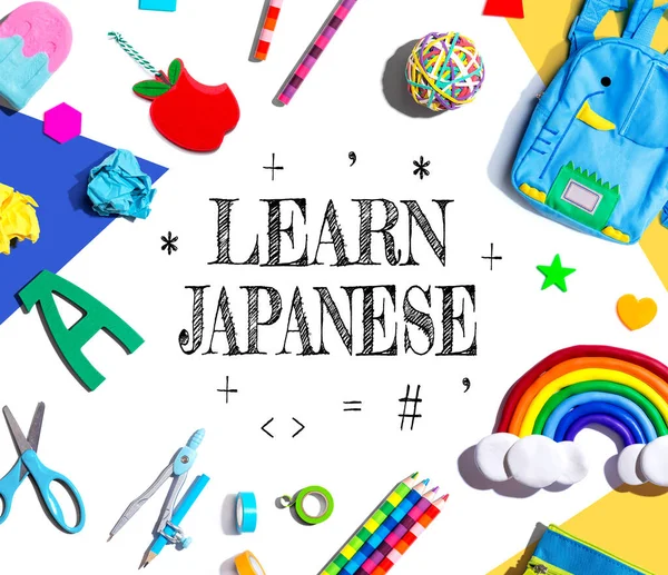 Learn Japanese theme with school supplies overhead view - flat lay