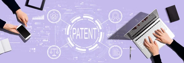 Patent Concept Two People Working Together — 스톡 사진
