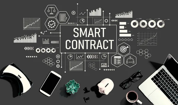 Smart contract theme with electronic gadgets and office supplies - flat lay