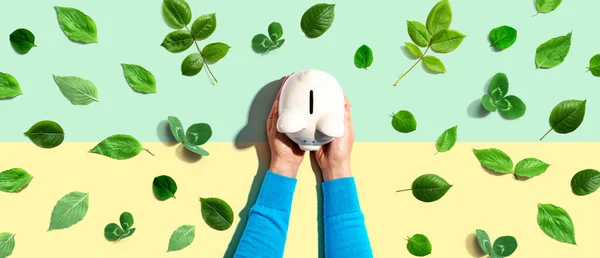 Person Holding Piggy Bank Green Leaves Flat Lay — Stock Photo, Image