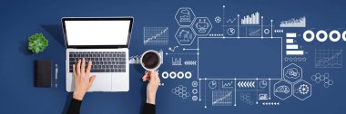 Industry 4.0 theme with person using a laptop computer