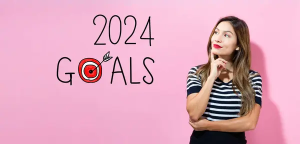 2024 Doelen Met Jonge Vrouw Een Bedachtzame Houding Rechtenvrije Stockafbeeldingen