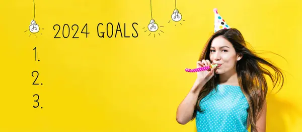 2024 Goals Young Woman Party Theme Yellow Background Stock Picture