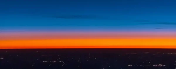 Dramatic colorful sunset over the horizon with Tokyo in the foreground