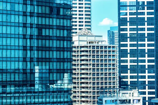 摩天大楼立面封闭的抽象城市背景模式 图库图片