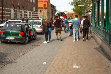 KRISTIANSTAD, SWEDEN - MAY 14, 2021: Palestine flag waved out from car during protest against Israels newly planned attacks on Gaza