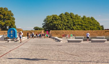 Tourists at the castle yard of Kronborg castle in Elsingore (Helsingr), Denmark
