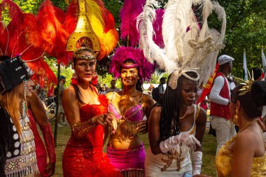 LANDSKRONA, SWEDEN - JULY 28, 2018: Women dressed up and painted for local carnival clipart