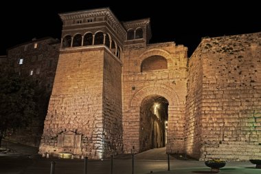 Perugia, Umbria, Italy: the Etruscan Arch or Augustus Gate, dating back 2400 years, is one of the eight gates of the ancient city walls clipart