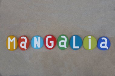 Mangalia ancient Callatis, city and a port on the coast of the Black Sea in the south-east of Constanta County, Northern Dobruja, Romania, creative hand painted multi colored stone letters over beach sand clipart