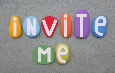 Invite me, creative message composed with multi colored hand painted stone letters over green sand clipart