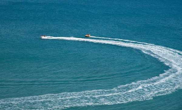 Aerial Drone Powerboat Towing Children Having Fun Donut Water Sports — Foto de Stock
