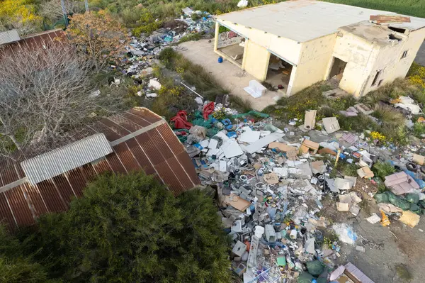 Stock image Nicosia, Cyprus, March 11 2023: Drone aerial of home and industrial wastes in nature. Environmental pollution