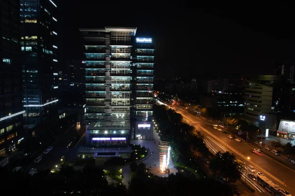 stock image Beijing, China, June 2 2018: Urban cityscape of Beijing city in China at night . Skyscraper and Cars moving on highway