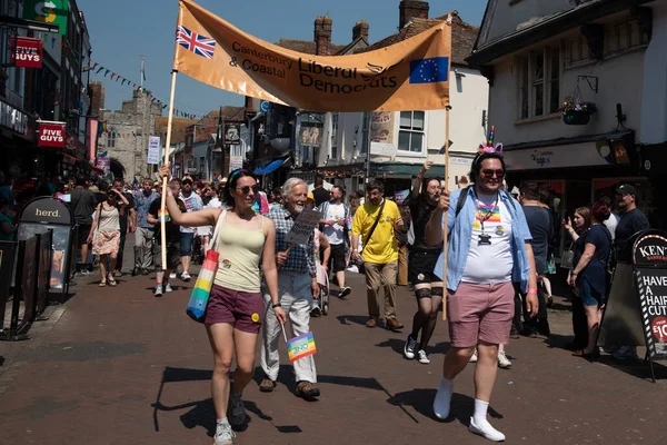 stock image Canterbury, Kent, United Kingdom, June 10 2023: Happy pride people and supporters parading at the pride parade at Canterbury city in Kent UK