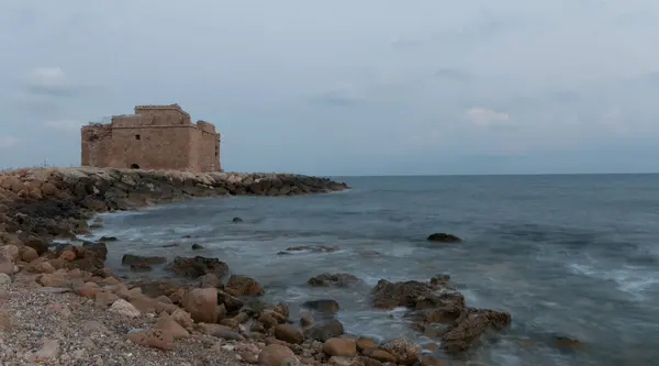 stock image Paphos castle at down. Coastal ancient historic castle landmark at Paphos harbor Cyprus