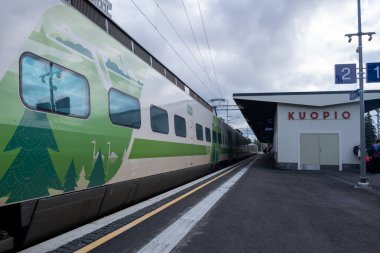 Kuopio, Finland, July 18 2024: Passenger train on the train station of Kuopio city ready for departure. Finland clipart