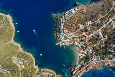 Drone aerial scenery of Greek village of Asos on the west coast of the island of Cephalonia , Kefalonia Greece in the island sea. clipart