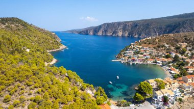 Drone aerial scenery of Greek village of Asos on the west coast of the island of Cephalonia , Kefalonia Greece in the island sea. clipart