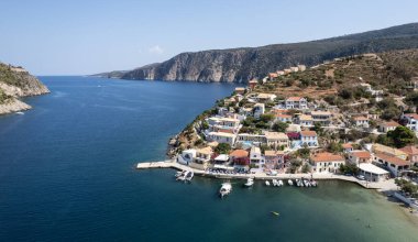 Drone aerial scenery of Greek village of Asos on the west coast of the island of Cephalonia , Kefalonia Greece in the island sea. clipart