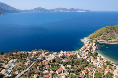 Drone aerial scenery of Greek village of Asos on the west coast of the island of Cephalonia , Kefalonia Greece in the island sea. clipart