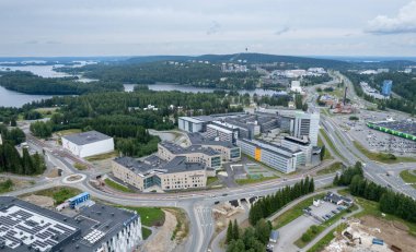 Kuopio, Finland, 17 July 2024: Drone aerial view of the Cityscape of Kuopio finland. University of eastern Finland area clipart