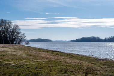 Danube Bend. The Danube River. Travel destination. Sightseeing cruises. Forests, clouds and flowing water.