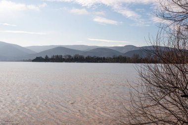 Danube Bend. The Danube River. Travel destination. Sightseeing cruises. Forests, clouds and flowing water.