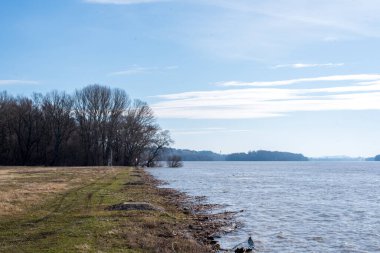 Danube Bend. The Danube River. Travel destination. Sightseeing cruises. Forests, clouds and flowing water.