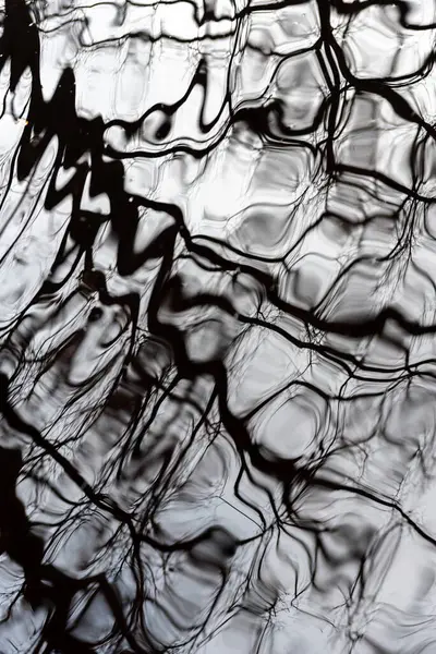 Reflections In Lake Water. Reflections of the water like an abstract painting