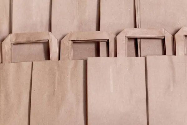 paper bags with handles for shopping. craft paper bag.