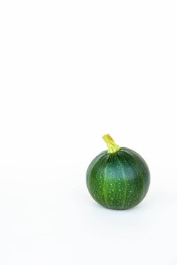 Green zucchini or round courgette - cucurbita pepo on white background clipart