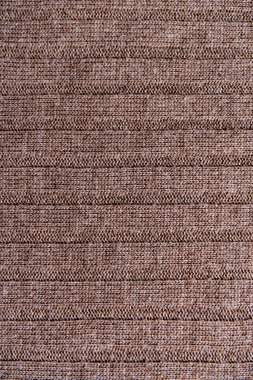 Arka plan olarak kahverengi örülmüş kumaş dokusu, üst görünüm