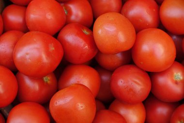 Delicious red tomatoes in Summer tray market agriculture farm full of organic. Fresh tomatoes, It can be used as background