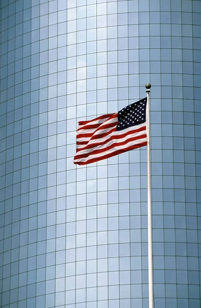 American flag in front of an office building in Manhattan,New York, USA