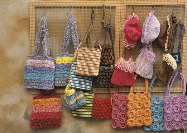Varied Coloured Crochet Bags Tourist Shop Italy Europe Stock Photo